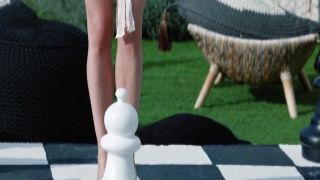 Lustful shemale skank Claudia masturbates on a sofa toy fucking her asshole