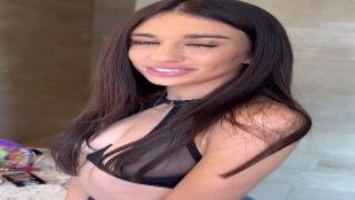 Leggy Asian chick Minnie Scarlet is undressing and masturbating